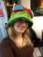 Minty wearing a Teemo hat