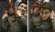 Matt with Masters of the Universe's Granamyr figurine, used to represent the NPC of the same name. Seen in Episode 8.