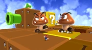  approaching two Grand Goombas in the beta version of Super Mario Galaxy 2.
