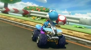 Light Blue Yoshi with a Mushroom in Mario Kart 8.