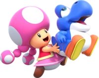 Toadette (a pink toad with pigtails) holds a blue baby Yoshi.