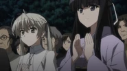 Sora and Kazuha clapping at the festival.