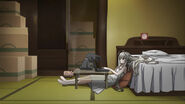 Sora using her laptop in her room.