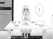 Sora sitting at the kitchen table.