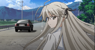 Sora being overtaken by the car driven by Yamanashi-san.
