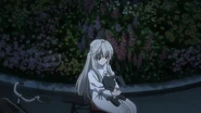 Sora sitting outside Hozumi's train station.