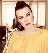 Personnage : Maggie Actrice : Debi Mazar