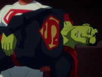 A green-skinned  suffers from Kryptonite poisoning.