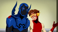 Impulse tries to keep Blue Beetle quiet