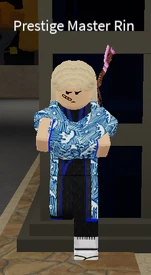 Prestige Master Rin by a telephone box outside of the Train Station.