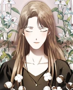 Nana is carefully placed in a coffin.