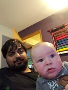 MutaharGallery6.jpg (140 KB) Mutahar with his godchild