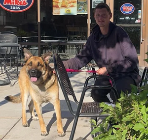 Daniel Larson with his dog