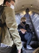 Grayson on an escalator