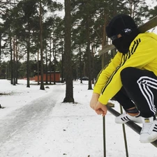 Boris squatting on a fence.