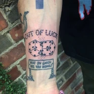 Kurtis's tattoos referencing his favourite music artists