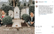 Bethany poses beside her Nazi ancestor's grave