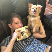 James, with Floof and his Diamond Play Button.