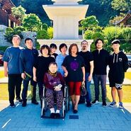 Markiplier and his family at his grandfather's resting place.