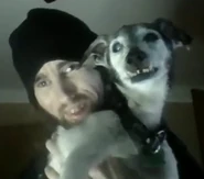 Cyraxx and his neglected pet dog, Bandit.