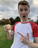 Tommy with his Youtooz figurine