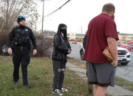 Alex with "Emily" and a police officer