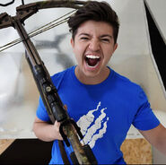 Preston with a crossbow.