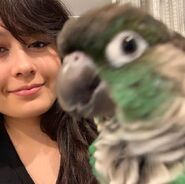 Jaiden with her pet bird, "Ari"