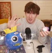 Albert, holding Roblox toys in 2024.[40]