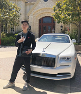 ricegum next to his car