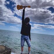 Tubbo with his ukulele