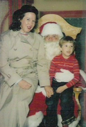 Chris & their mother Barbara with a Santa Claus impersonator in December 1987.