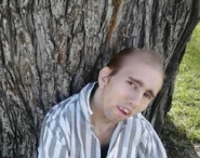 Cyraxx wearing a suit.