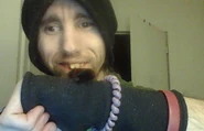 Cyraxx holding a hairy caterpillar.