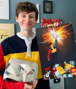 Jack holding his YouTube Diamond Play Button