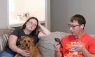 Mr. Beat next to his wife and his dog