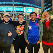 Alex and his dad (to his right)