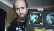 Cyraxx showing off his fake award plaque