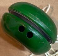it is made of tin, and whistles as it spins.