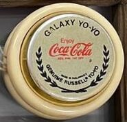 Galaxy yo-yo but but has a white body and gold-plated sidecaps (prize yo-yo)