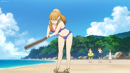 Blindfolded Mio splits on the sand land (2)