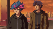 Yusaku walking with Kusanagi