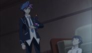 Yusaku and Ai learning about the next target.