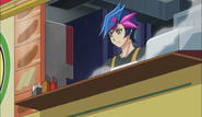 Yusaku making hot dogs