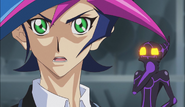 Yusaku hearing that Go knows the identity of Playmaker.