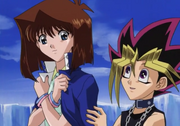 EP 104 Yugi gives Téa his jacket.