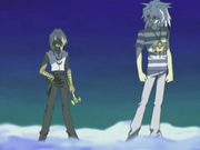 Marik telling Yami Bakura to enter the Battle City finals