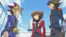 Yugi, Jaden, and Yusei team up.