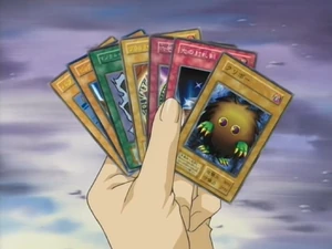 A hand of cards in the second series anime.