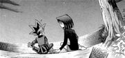 Yugi and Anzu hold hands.